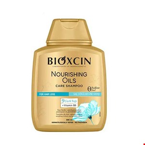 شامپو ضد ریزش مو بیوکسین مدل روغن ۹ گیاه  مناسب موهای خشک و اسیب دیده 300 میل مدل Bioxcin Nourishing Oils